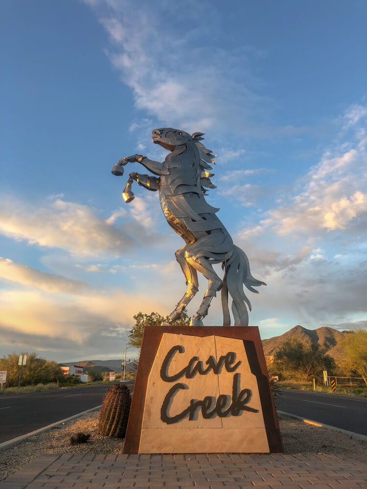 Cave Creek Monuments" Spirit of the Horse by Mark Carol - sculpted out of stainless steel that stands on a rusty steel and stone base, the Sculptures welcome visitors