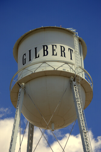 water tower with the name Gilbert on it
